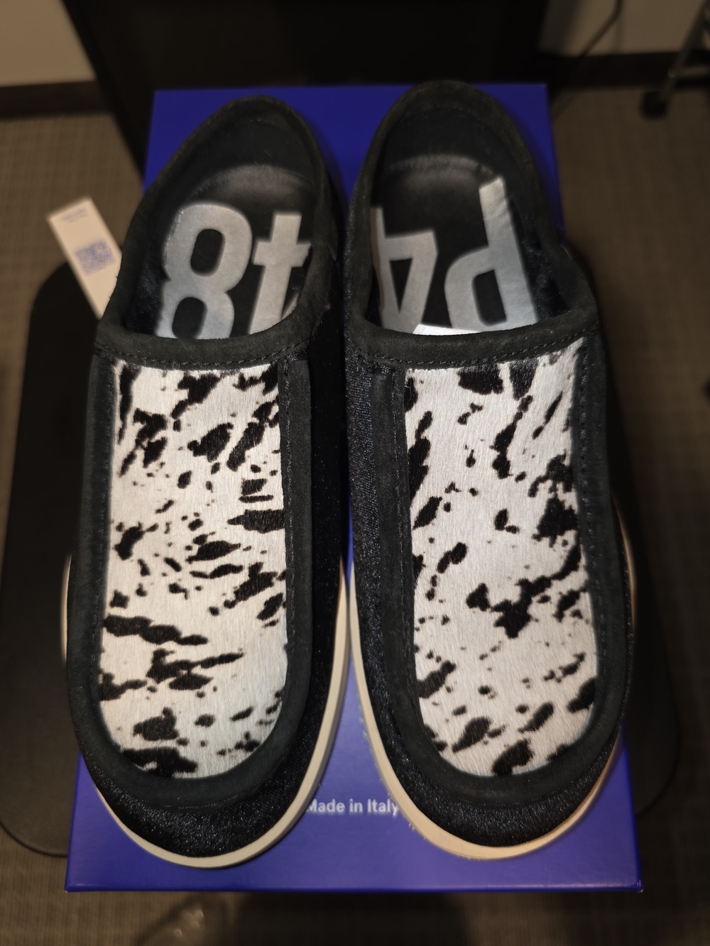 P448 Black and White Cow-Print Slip-On Moccasins